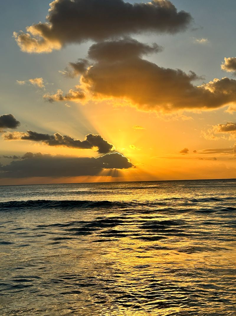 Golden sunset rays over the ocean