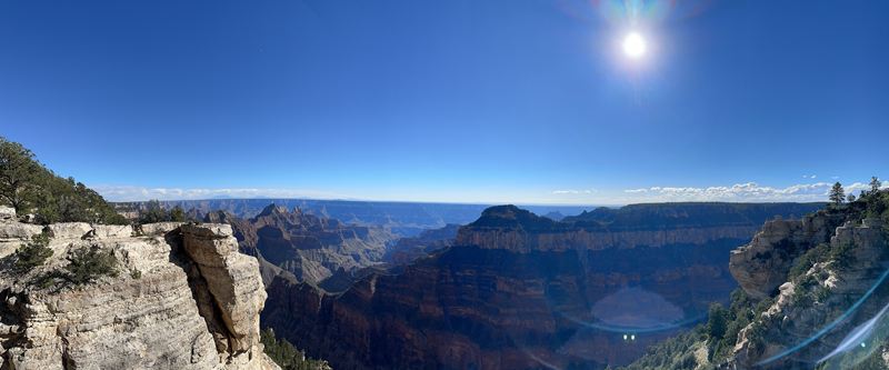 Panorama of a vast canyon from a rocky viewpoint